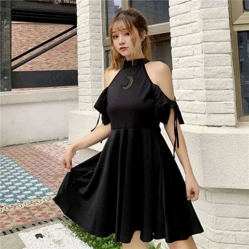 Autumn trendy sexy black bodycon dress with hollow moon design featuring cutouts.