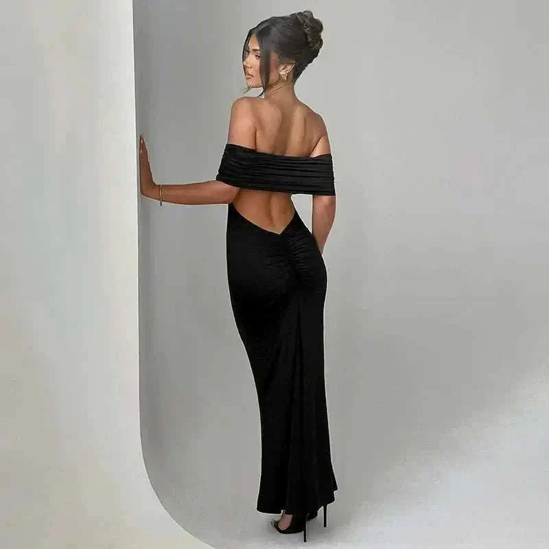 Elegant backless off-shoulder dress with figure-hugging silhouette, perfect for special occasions.