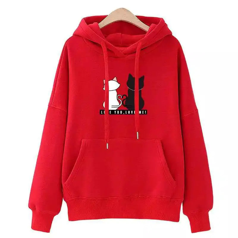 Rouge ample à capuche avec motif cartoon de chats, parfait pour un look décontracté et tendance.
