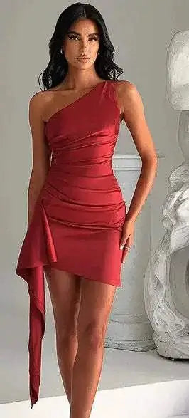 One-shoulder sleeveless mini dress in solid color with stylish backless design.
