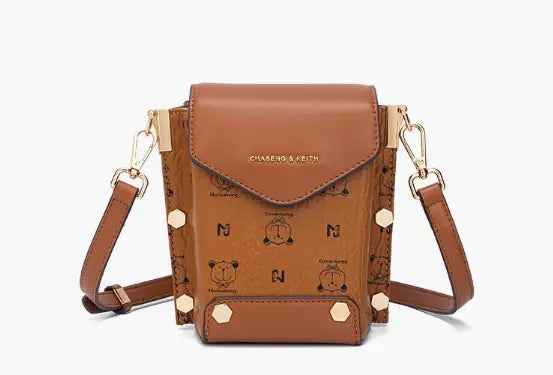 Chic brown crossbody bag with animal print, gold hardware, and adjustable strap for stylish women.