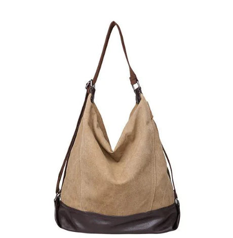 Versatile canvas shoulder and crossbody bag with a soft beige exterior and dark brown base, ideal for daily use.