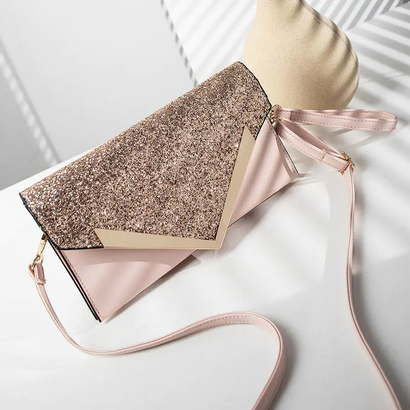Stylish sequined envelope shoulder bag in pink and gold, perfect for modern women and versatile for any occasion.
