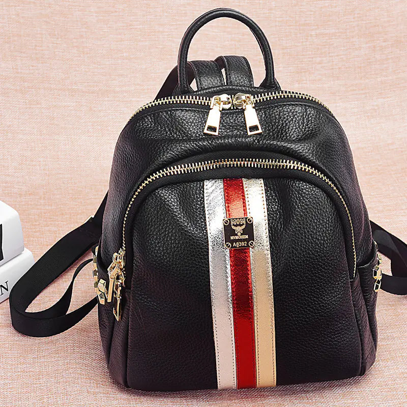 Stylish black leather backpack with metallic stripe detail, perfect for college or everyday use.