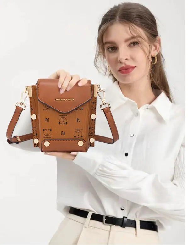 Spring 2019 crocodile pattern crossbody bag for women, stylish accessory in PU material.