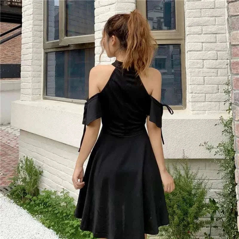 Autumn trendy sexy bodycon dress with hollow moon design, black, back view.