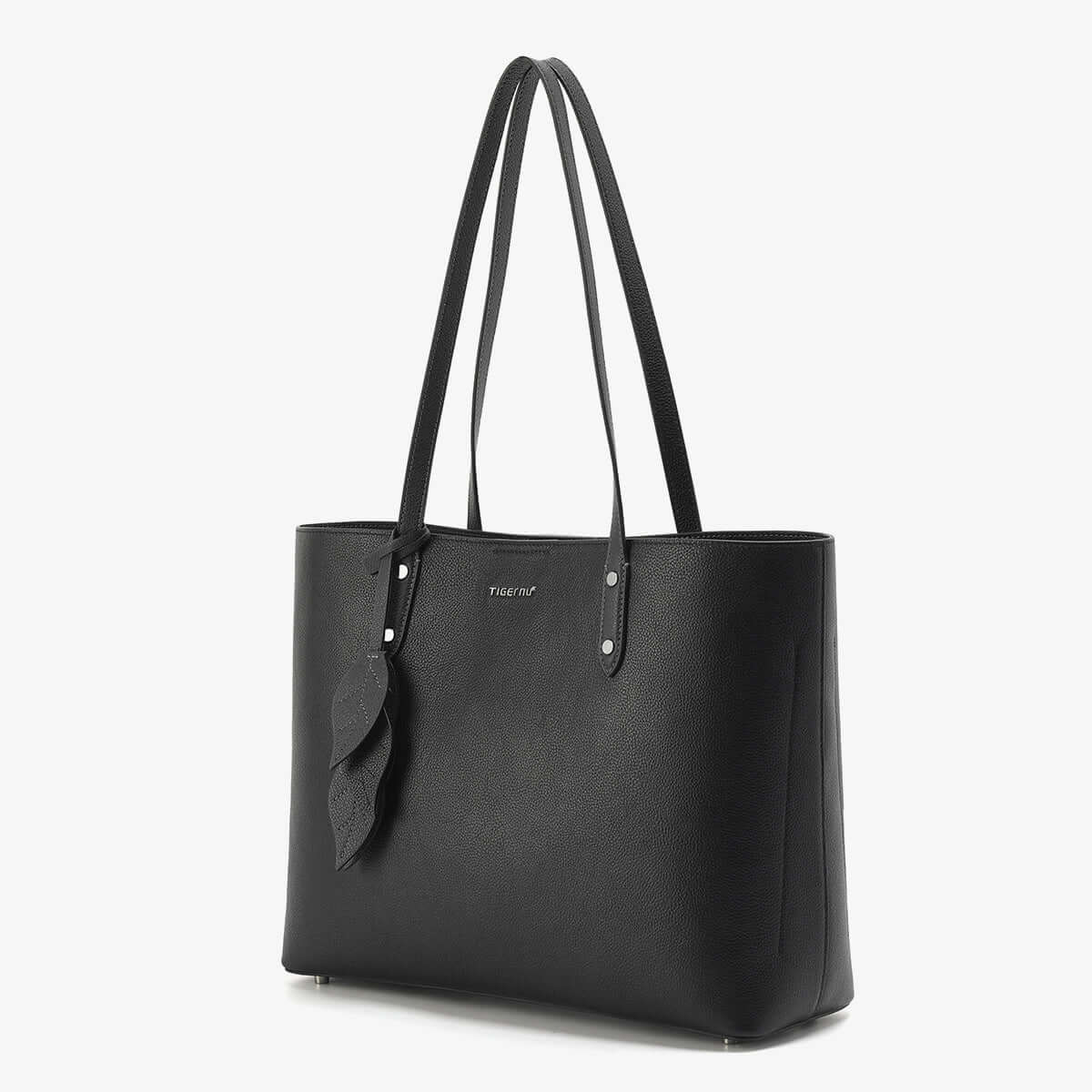 large capacity leather handbag in elegant black design with soft handles and minimalistic style