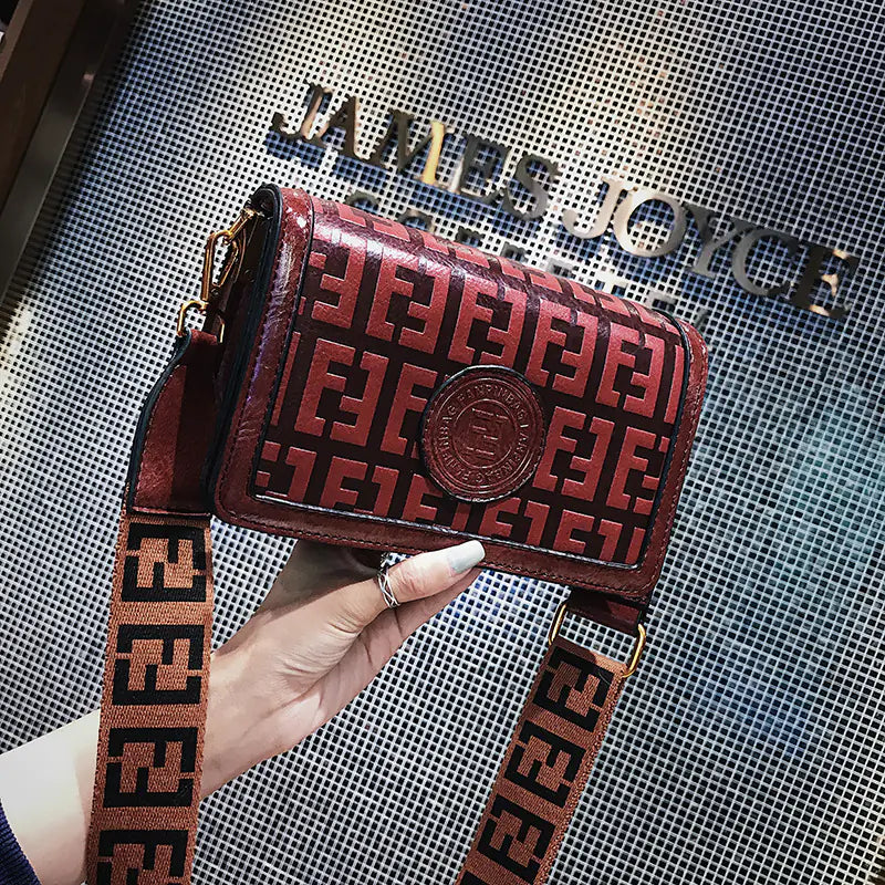 Vintage Shoulder Crossbody Bag, stylish retro handbag with logo and patterned strap, perfect for everyday use.