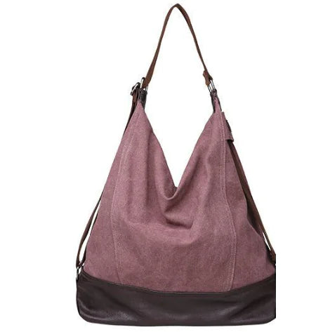 Versatile canvas shoulder and crossbody bag in stylish mauve with brown leather accents, perfect for daily use.