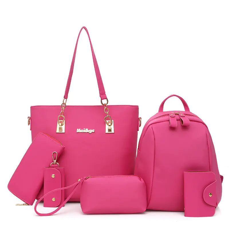 Bright pink nylon tote bag set including tote, backpack, wallet, and accessories for stylish women.