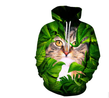3D printed loose fit hoodie featuring a cat design surrounded by vibrant green leaves.
