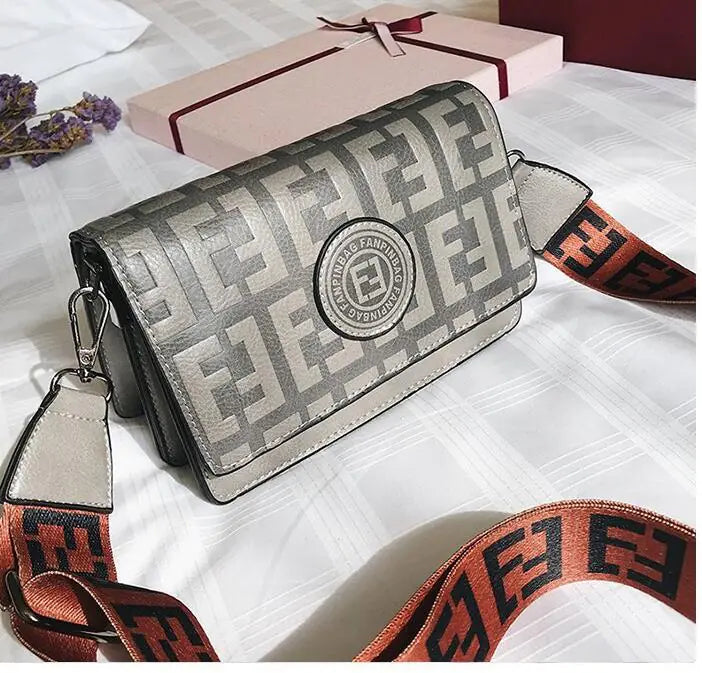 Retro style mini shoulder bag for women with chic pattern and trendy strap, perfect for modern outings.