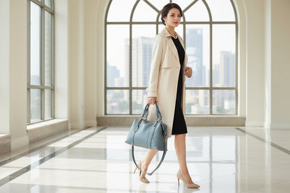 Fashion Women Bags Ladies Hand Bags Shoulder Bag Handbag being carried by a stylish woman in a modern setting.