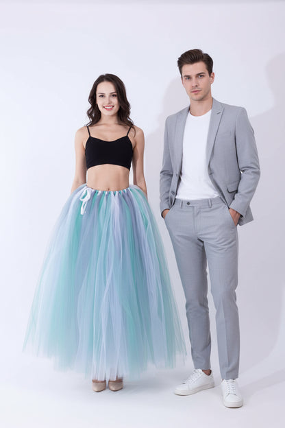 Pregnant woman dress featuring a flowing tulle skirt in pastel colors, perfect for pregnancy fashion.