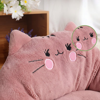 Trending cartoon pet bed with cute cat face design in soft pink fabric, perfect for dogs and cats.