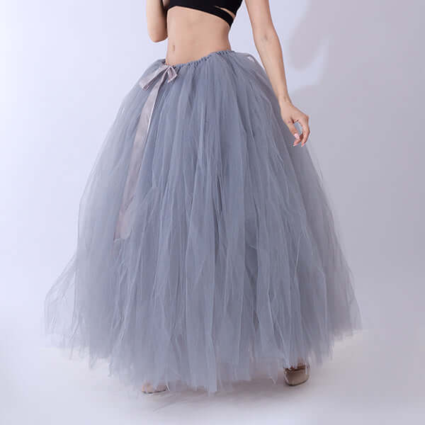 Pregnant woman dress in soft gray tulle with ribbon detailing, perfect for stylish maternity wear.