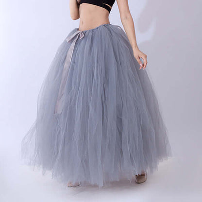 Pregnant woman dress in soft gray tulle with ribbon detailing, perfect for stylish maternity wear.