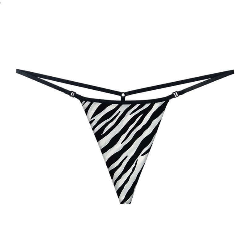 Ultrathin a string thong woman in bold black and white zebra print design.