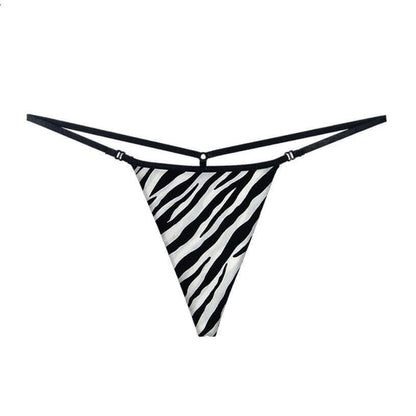 Ultrathin a string thong woman in bold black and white zebra print design.