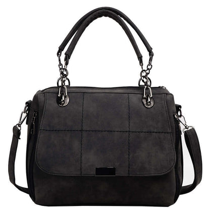 Large capacity matcha green shoulder bag in stylish black PU leather with chain detailing and dual handles.