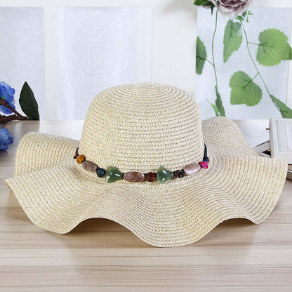 Hand-Woven Read Strange Stone Decorative Straw Hat Woman with colorful stones, perfect for beach days and summer outings.