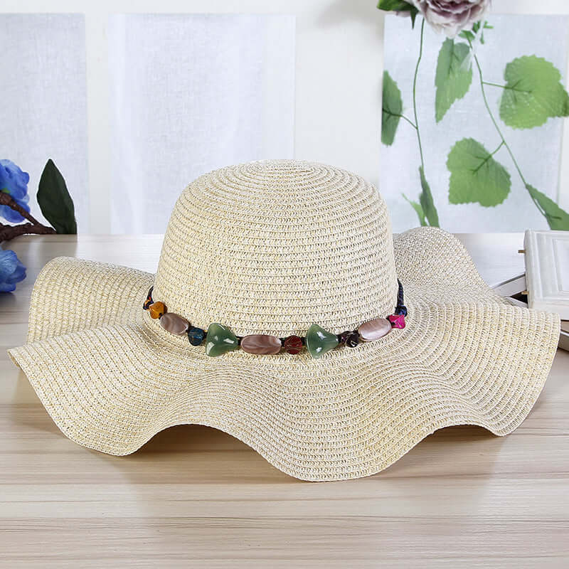Hand-Woven Read Strange Stone Decorative Straw Hat Woman with colorful stones, perfect for beach days and summer outings.