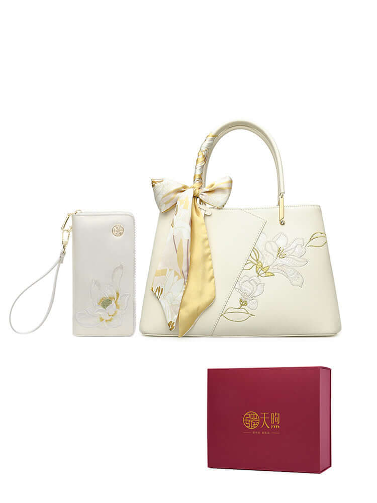 Elegant pearl cowhide handbag with matching wallet and gift box, perfect for special occasions.