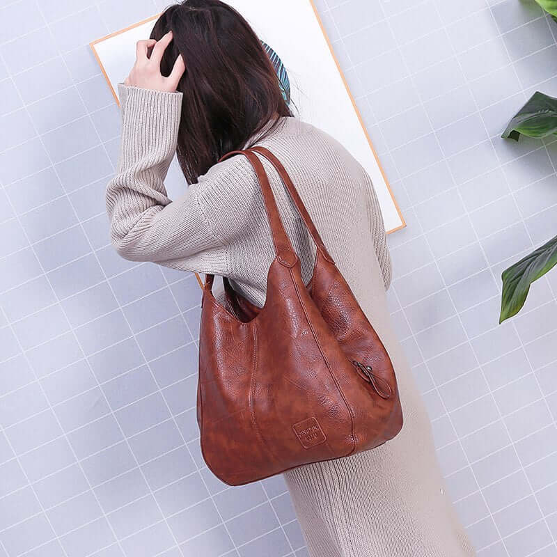 Women\u0027s Handbag PU Leather - Elegant & Practical Shoulder Bag in brown on model with casual outfit.