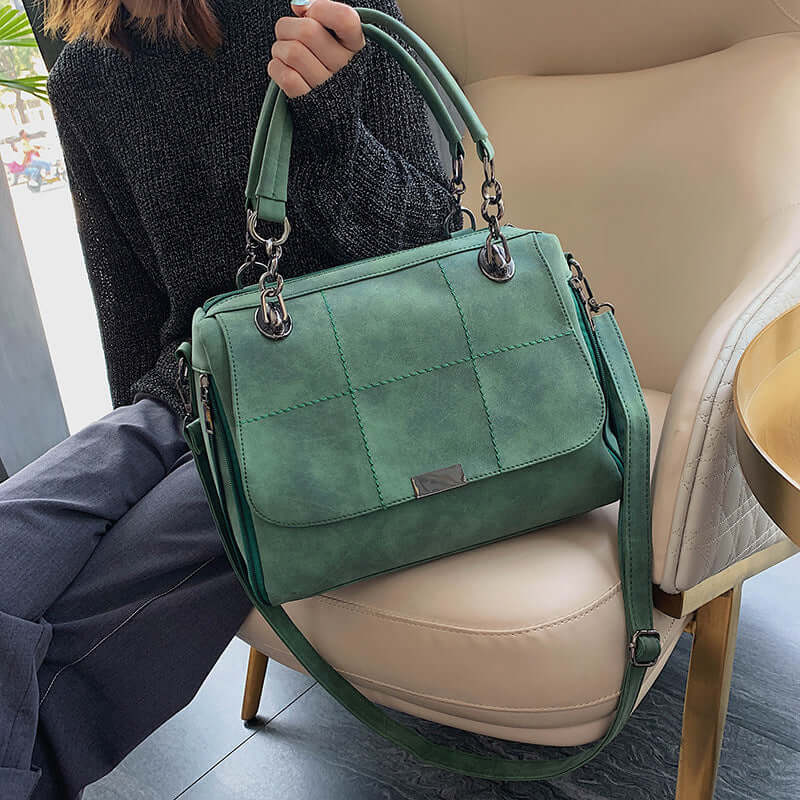 Large capacity matcha green shoulder bag made of PU leather, stylish design, perfect for travel and everyday use.