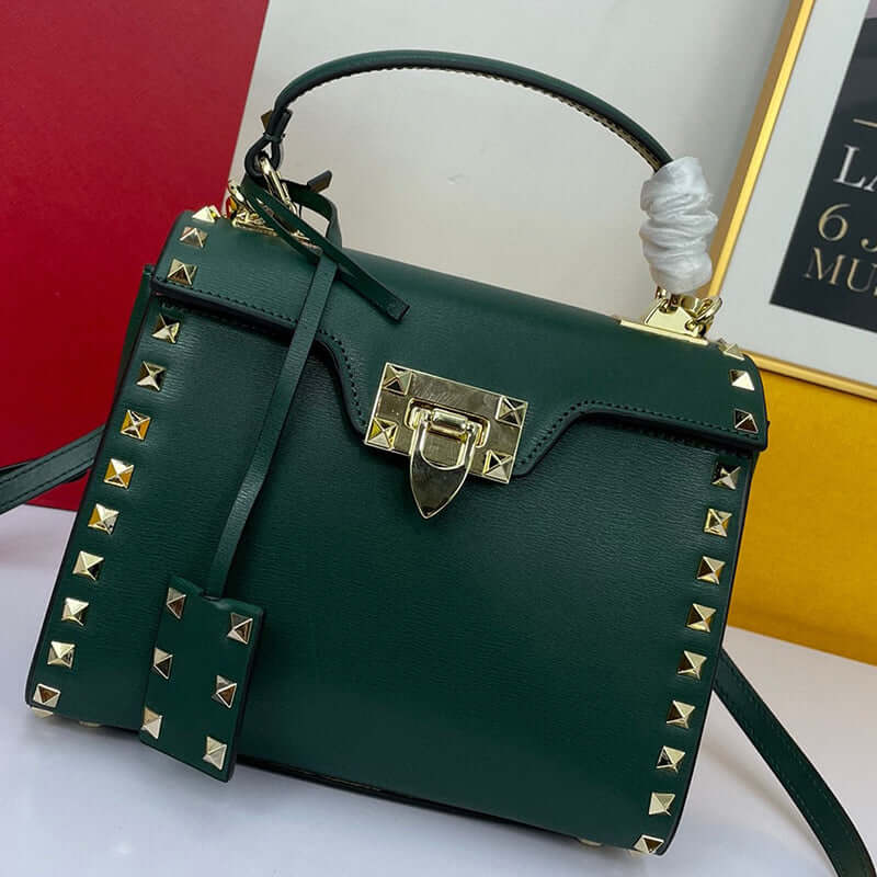 Cowhide Rivet-bound Women's Bag With Single-shoulder Messenger Pattern, stylish green bag with gold studs and lock.