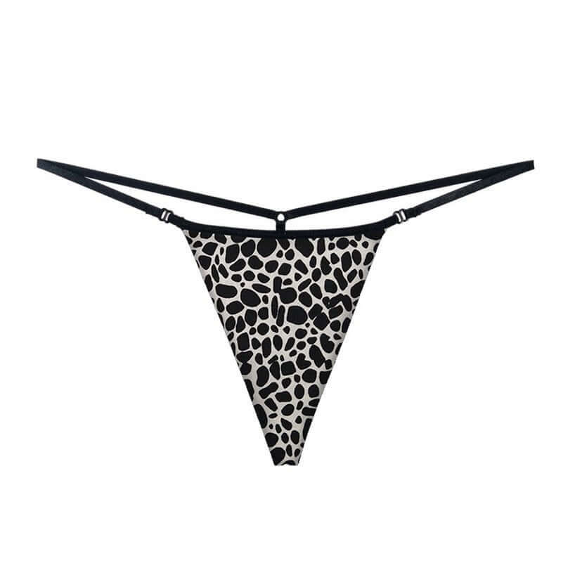 Ultrathin a string thong woman featuring a bold black and white leopard print design.