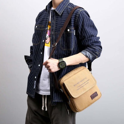Shoulder Bags worn by a model, showcasing a khaki canvas bag with polyester lining, featuring a reasonable structure.