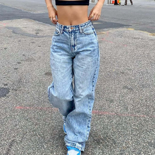 European And American Slim Fashion Jeans Woman in light blue denim, high waist, casual street style outfit.