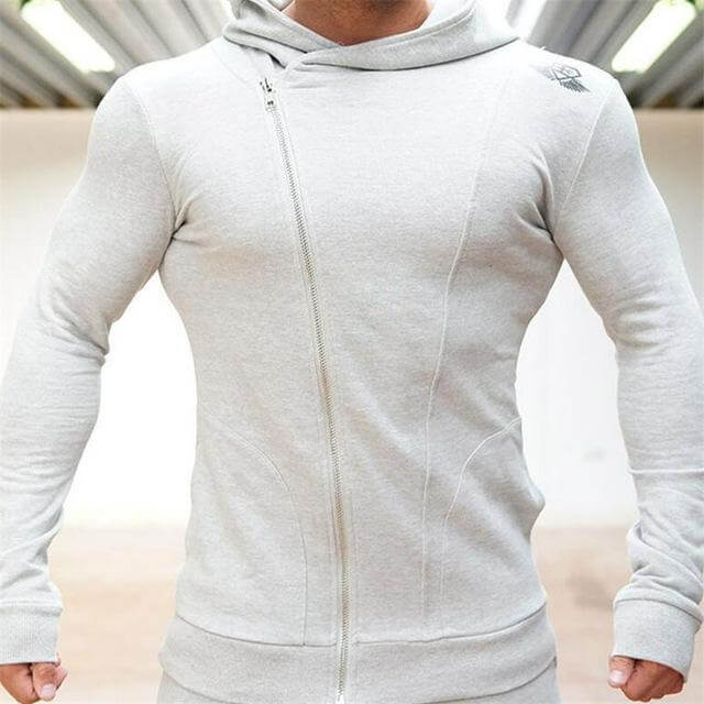 New Gyms Slim Fit Hoodies in light gray, showcasing a contemporary zip design and snug fit perfect for workouts.