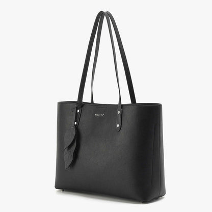 Large capacity leather handbag, minimalist design, spacious black tote with soft handles and leaf detail.