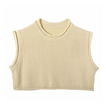 Knitwear top vest woman in solid cream color, featuring a loose fit and regular sleeves.