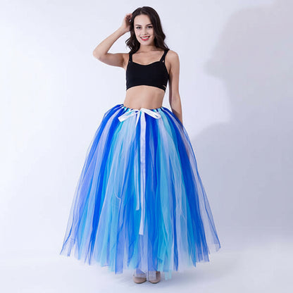 Pregnant woman dress featuring a colorful layered tulle skirt with blue hues and a white ribbon.