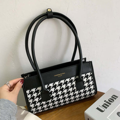 New Tide Autumn Winter Fashion Versatile Plaid Hand Carry Bags displayed with trendy design and stylish black and white fabric.