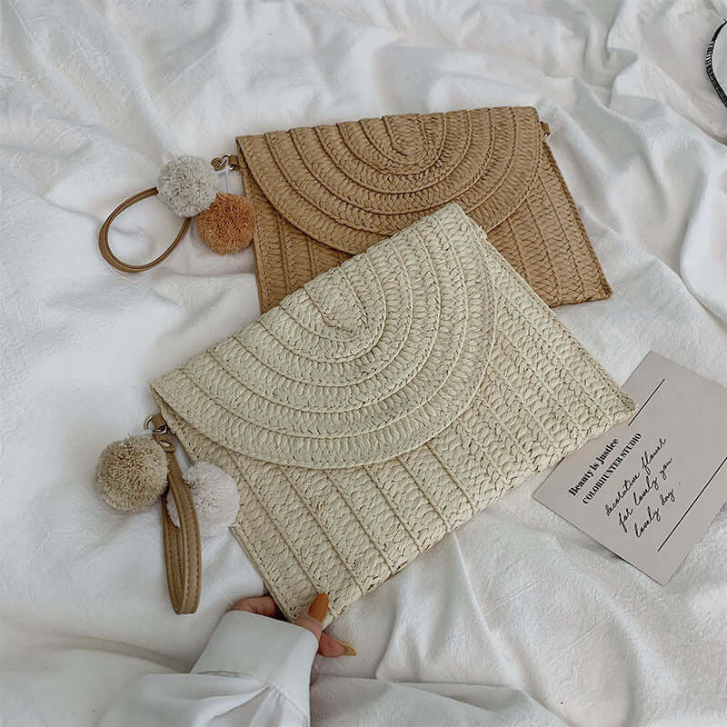 New style hand woven bags in summer featuring unique textures and pompom accents.