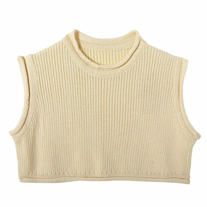Knitwear top vest woman in solid cream color, sleeveless, made of 100% polyester fabric, casual leisure style.