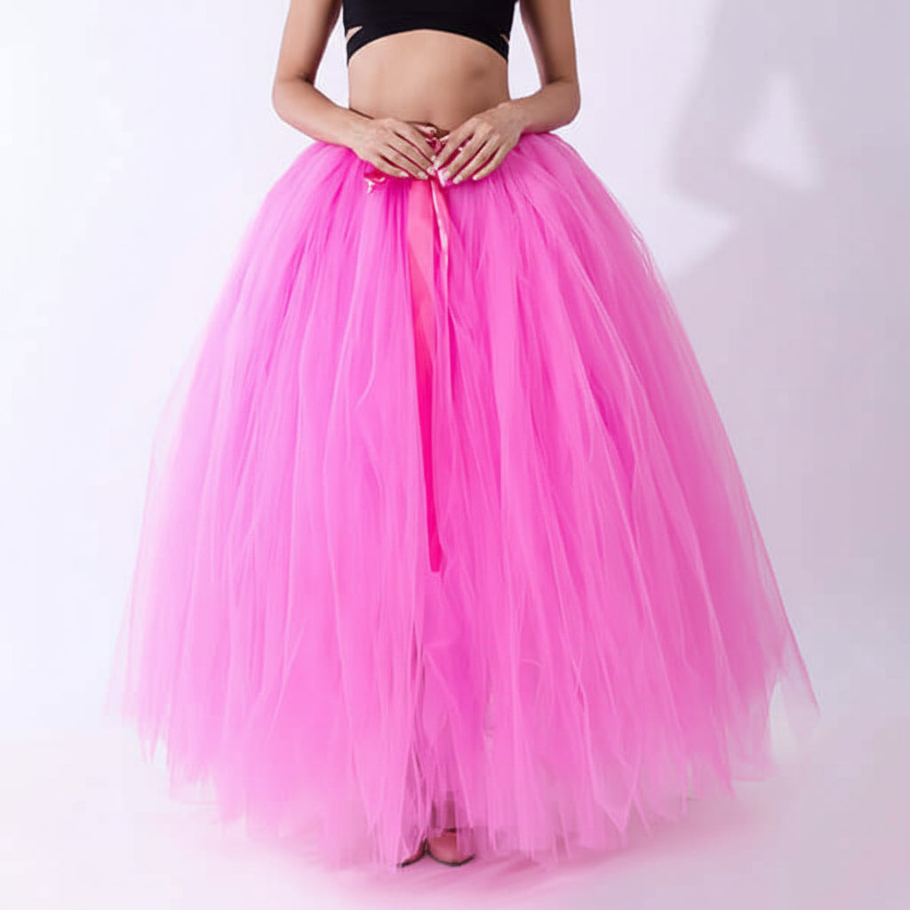 Pregnant woman dress in pink tulle skirt, featuring a flowy design for comfort and style.