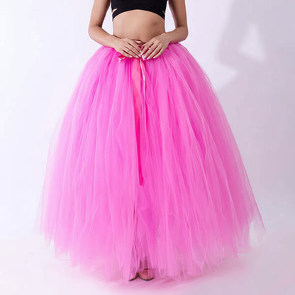 Pregnant woman dress in pink tulle skirt, featuring a flowy design for comfort and style.