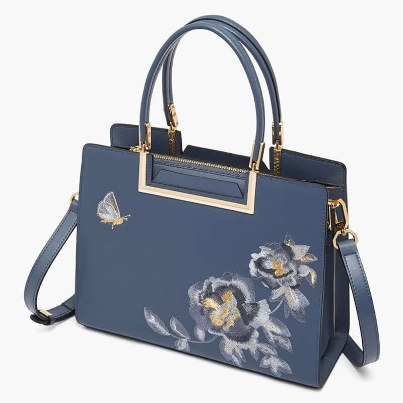 Fashion Embroidered Crossbody Bag Women with floral embroidery and butterfly design in elegant blue.