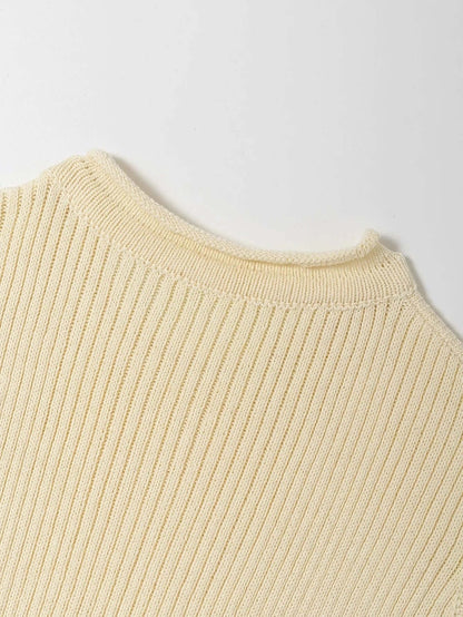 Knitwear top vest woman back view showing ribbed neckline and fabric texture in light beige color.