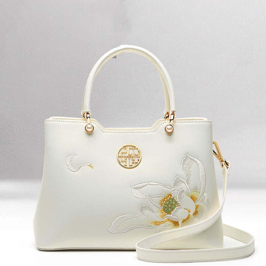 Cowhide Floral Crossbody Shoulder Bag for Cheongsam in white with floral embroidery and elegant design.
