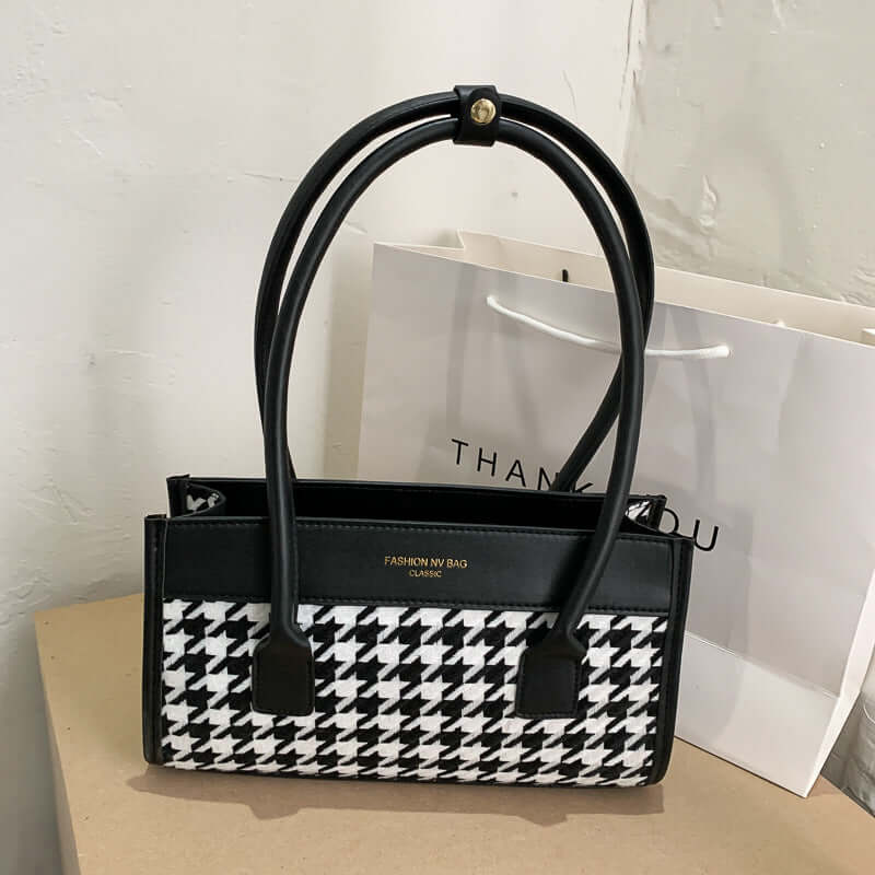 New Tide Autumn Winter Fashion Versatile Plaid Hand Carry Bags displayed on a table with a thank you bag.