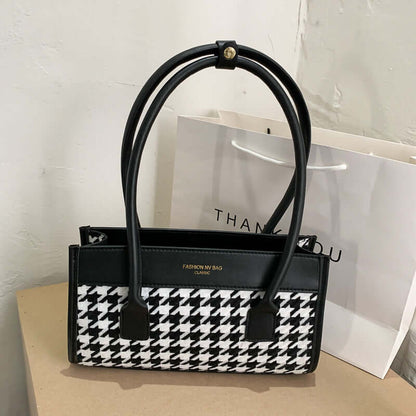 New Tide Autumn Winter Fashion Versatile Plaid Hand Carry Bags displayed on a table with a thank you bag.