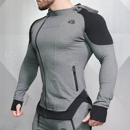New Gyms Slim Fit Hoodies in gray, designed for a comfortable fit during workouts. Perfect for active lifestyles.