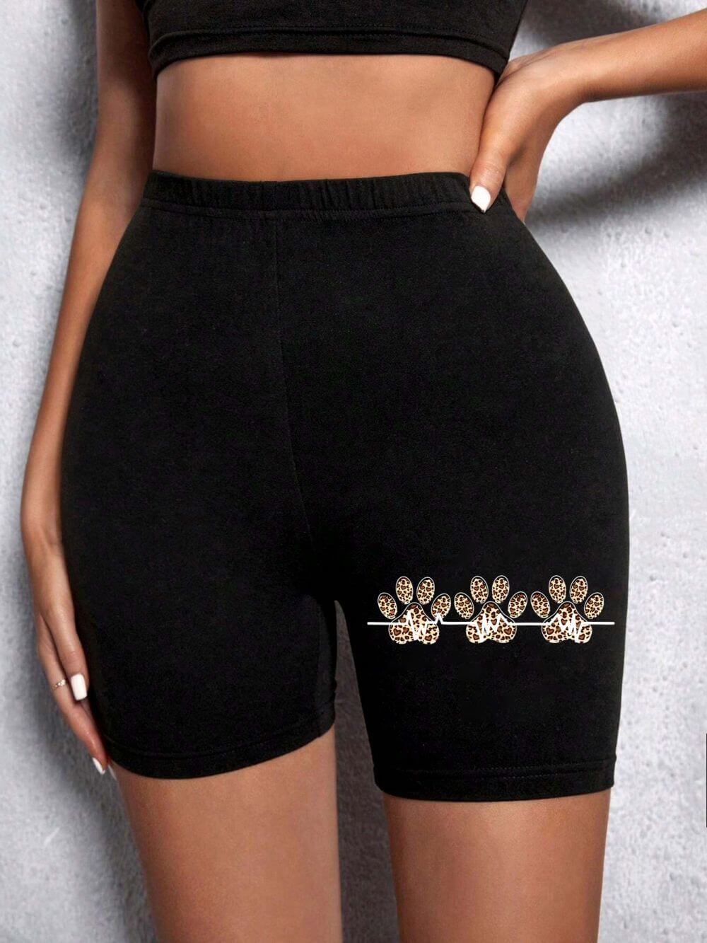 Summer Woman Tight Shorts Leopard Heart And Love Letter Grap in black fabric with decorative leopard print details.