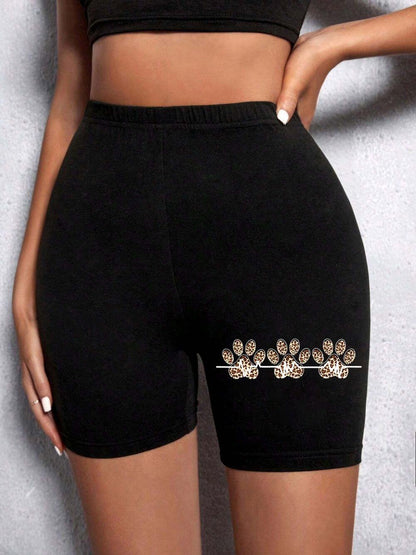 Summer Woman Tight Shorts Leopard Heart And Love Letter Grap in black fabric with decorative leopard print details.